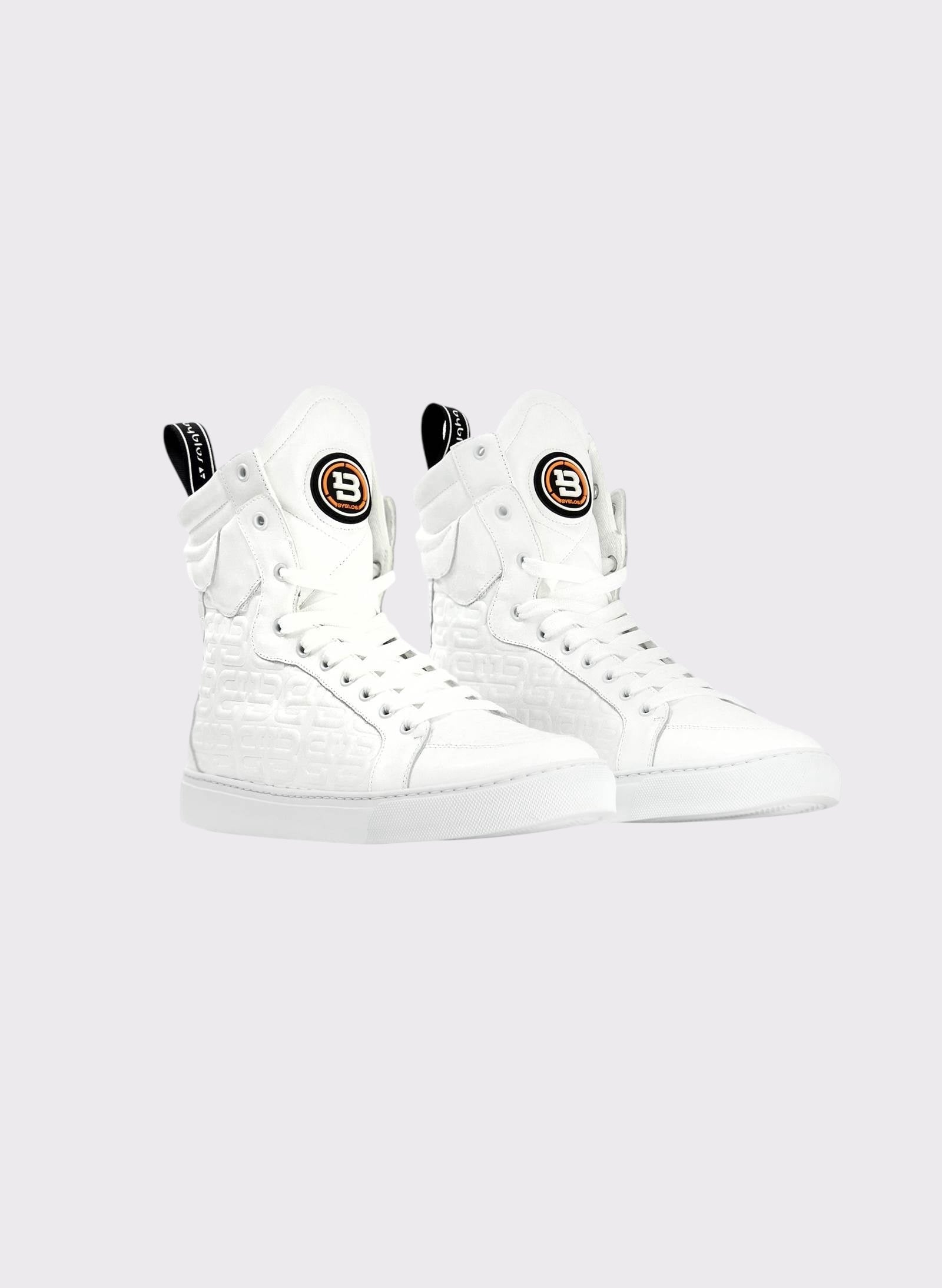 White high-top sneakers with black accents on a white background