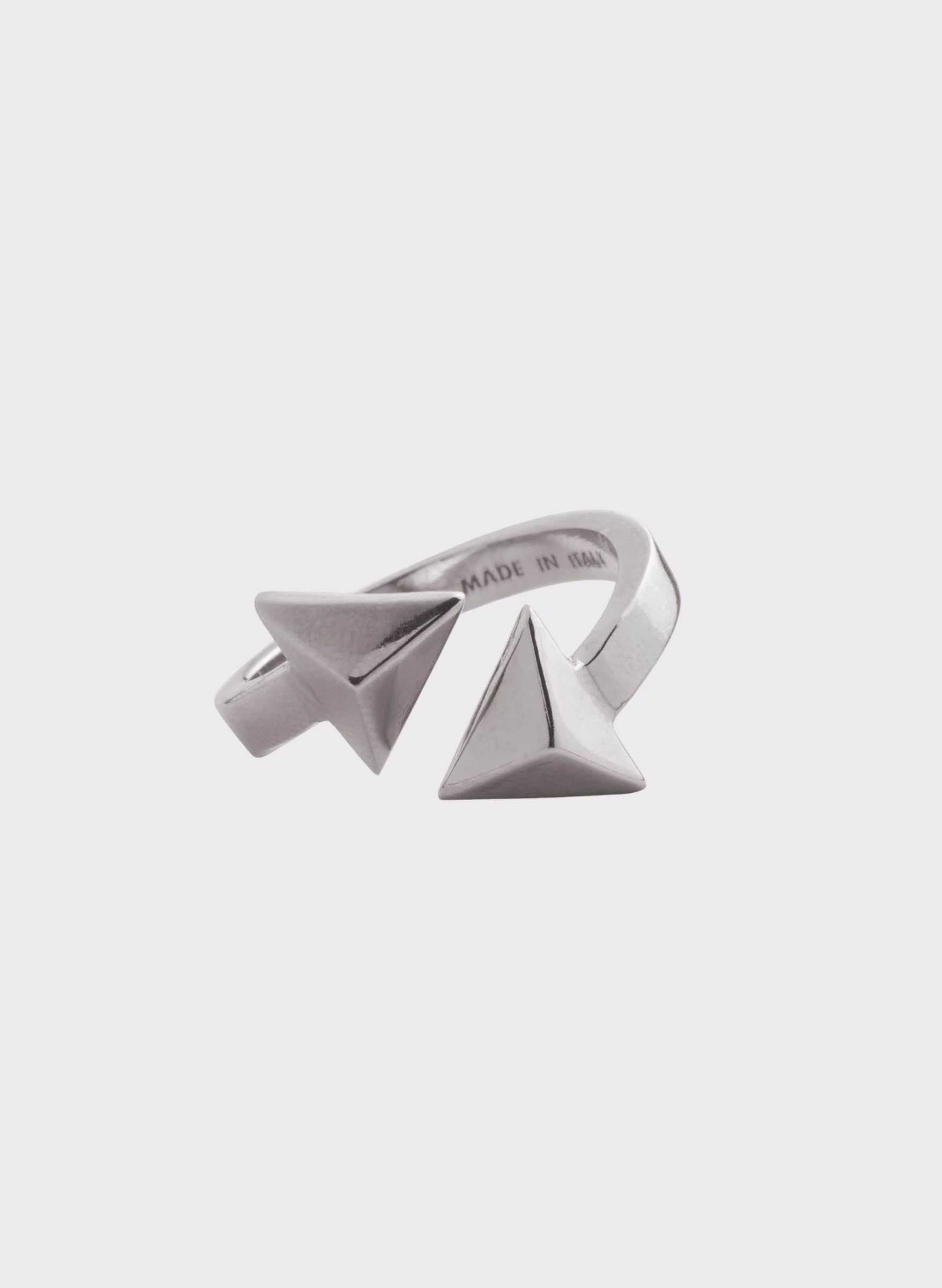 Silver ring with geometric design on a white background