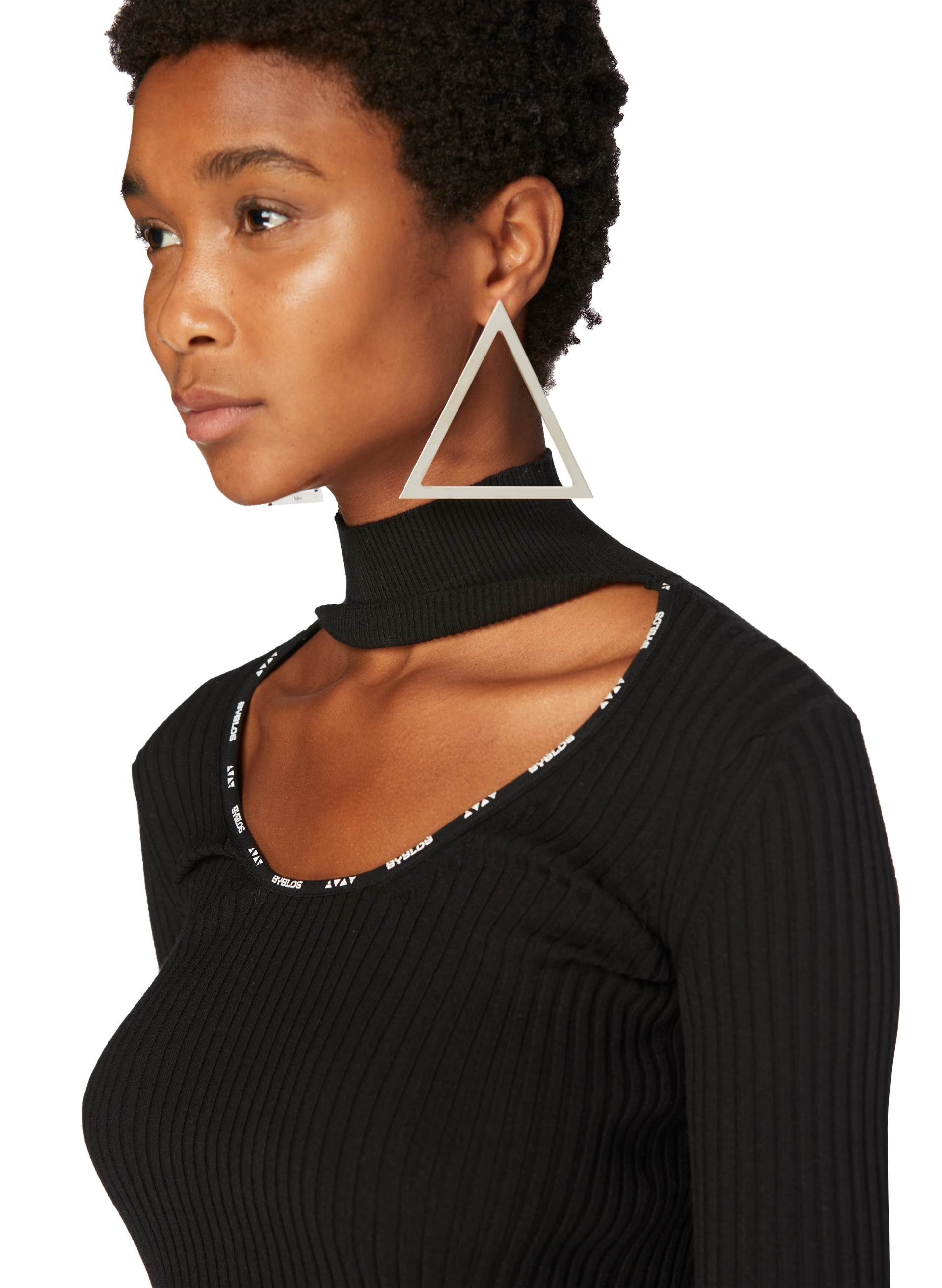 Model wearing a Knit Logo Crop Top with a high neck and a bold triangular earring, showcasing contemporary elegance by Byblos.